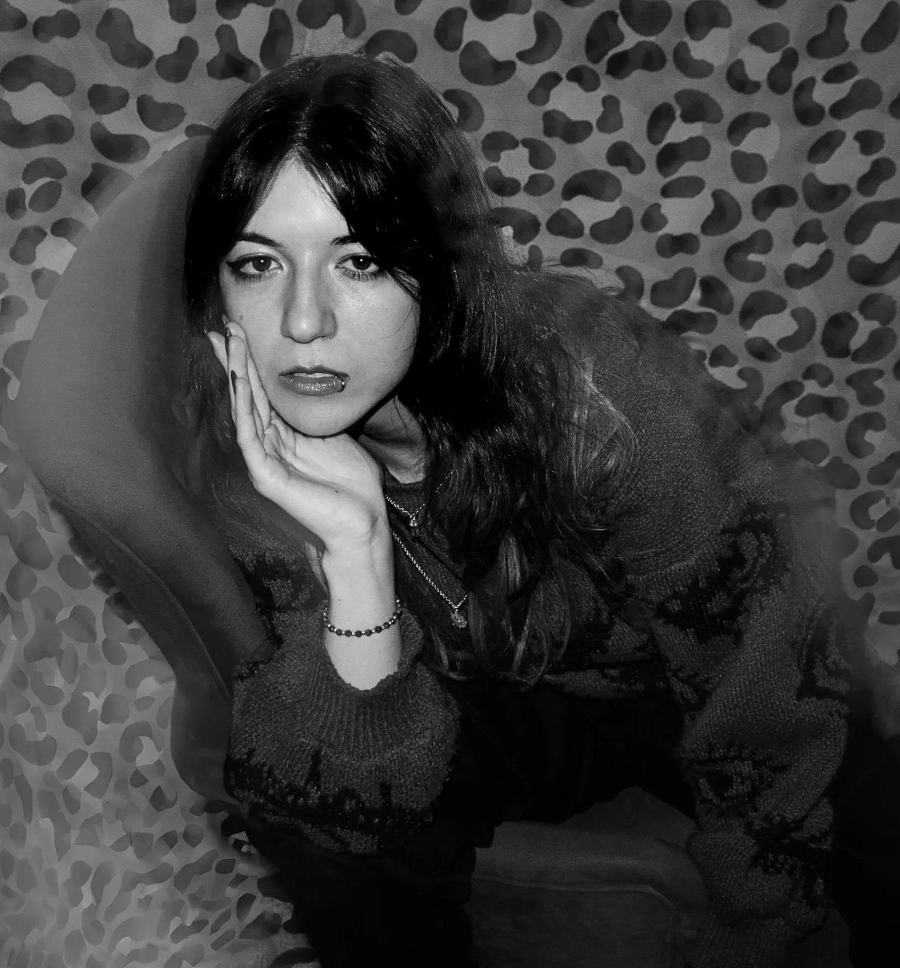 Black-and-white portrait of the photographer